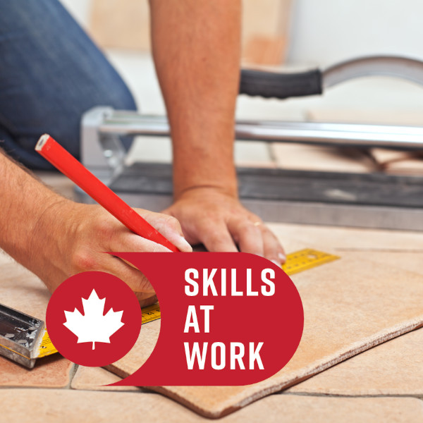 Laying ceramic floor tiles - man hands marking tile to be cut, closeup Over 55 Skills At Work - Man cutting floor tile